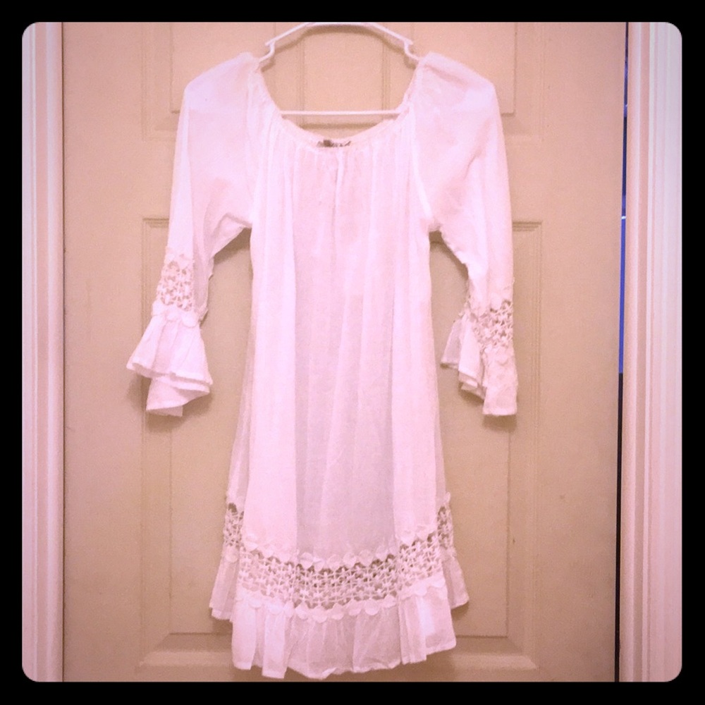 White cover up. Never worn. New with tags.